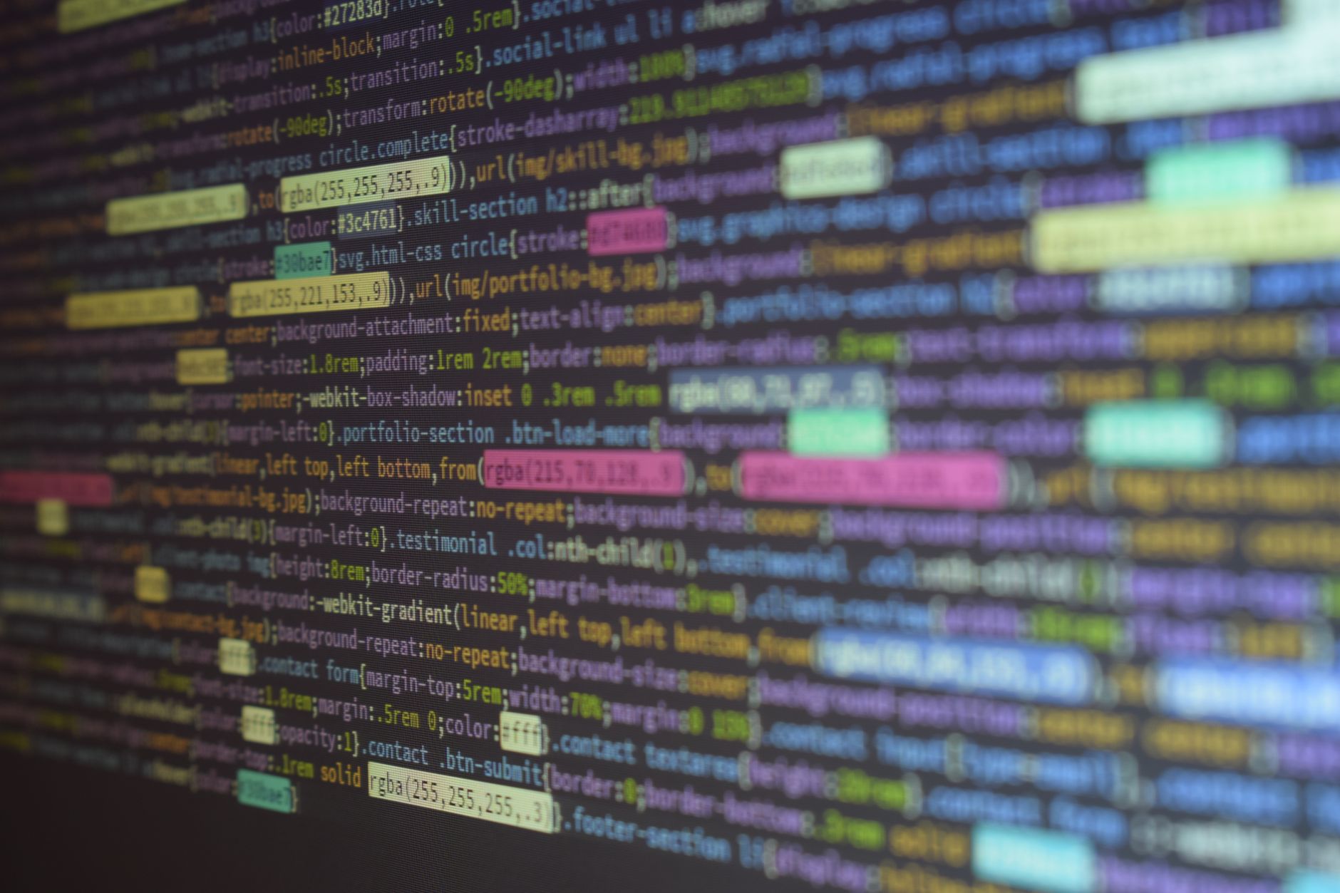 a terminal screen displaying cascading lines of autonomous script output in a dimly lit server operations room