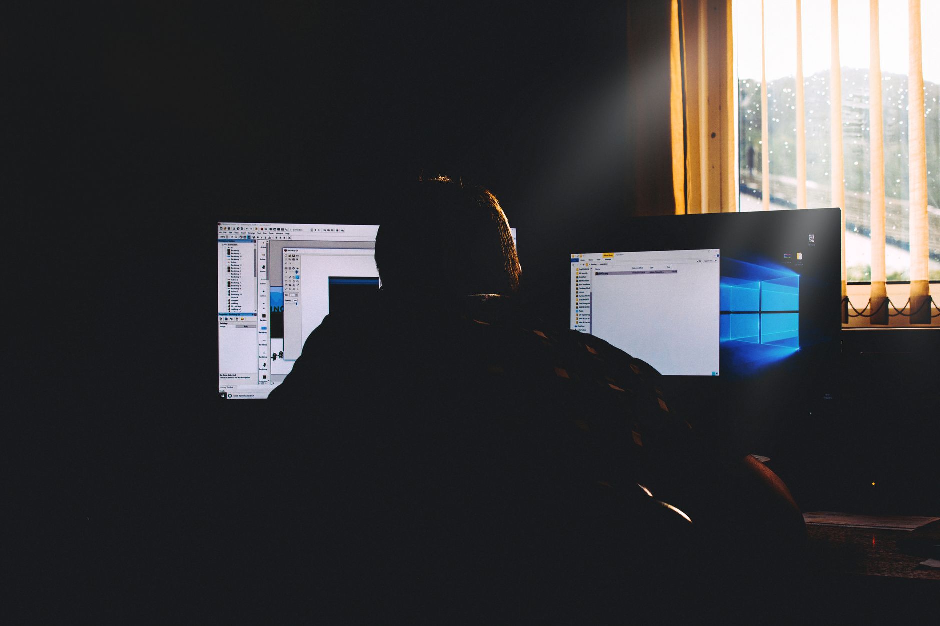 rows of file directories and log entries displayed on a terminal screen in a dimly lit research lab, with cursor blinking on a flagged prompt entry