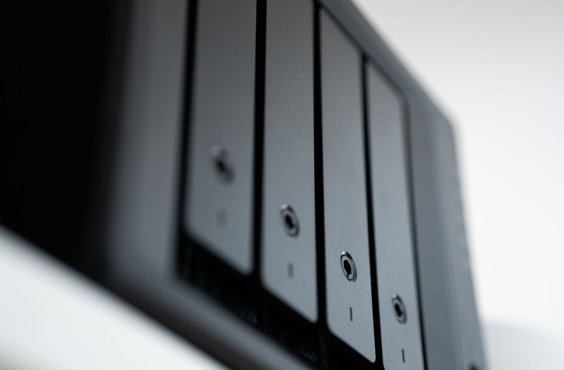 a row of enterprise NVMe solid-state drives mounted in a data center storage array chassis