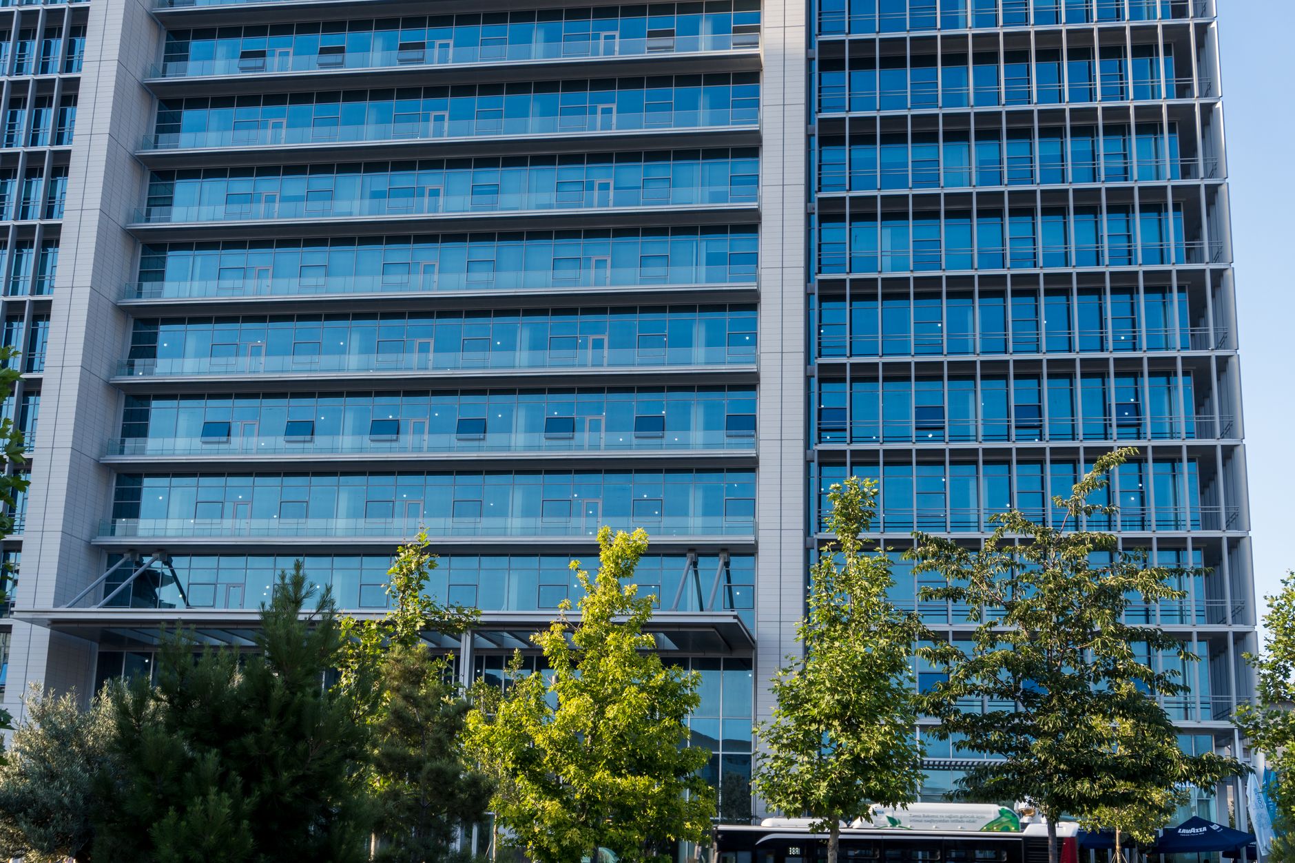 exterior of the CDC headquarters building in Atlanta, Georgia, wide-angle view showing the facade and surrounding grounds on an overcast day