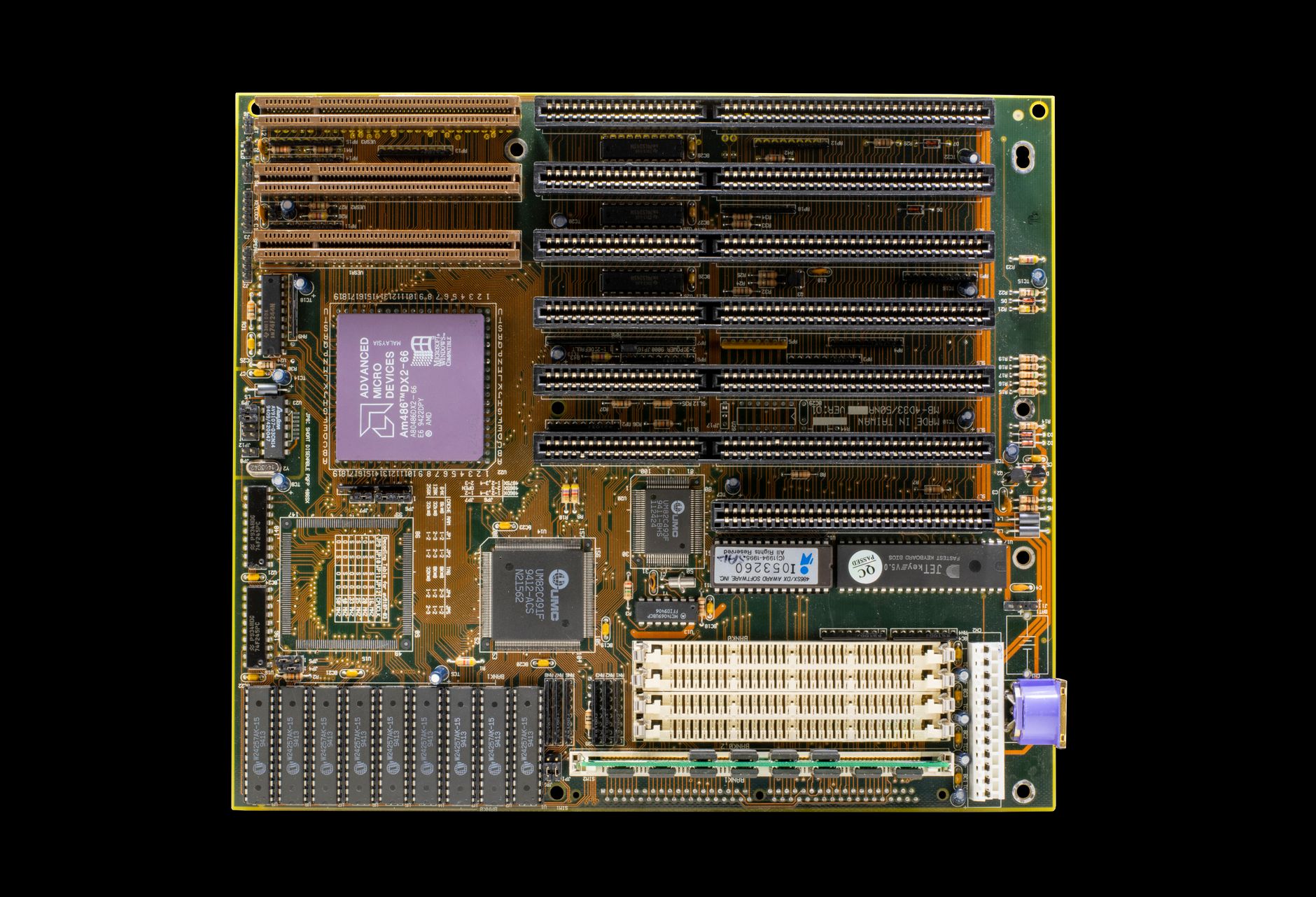 a 6U VME chassis rack with populated single board computer slots mounted in a military-grade electronics enclosure, set against a sparse equipment bay with metal shelving
