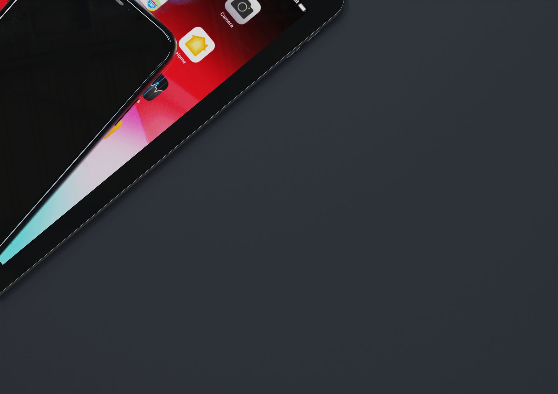 a thin folding smartphone form factor resting open on a dark matte surface, screen facing upward with no content displayed