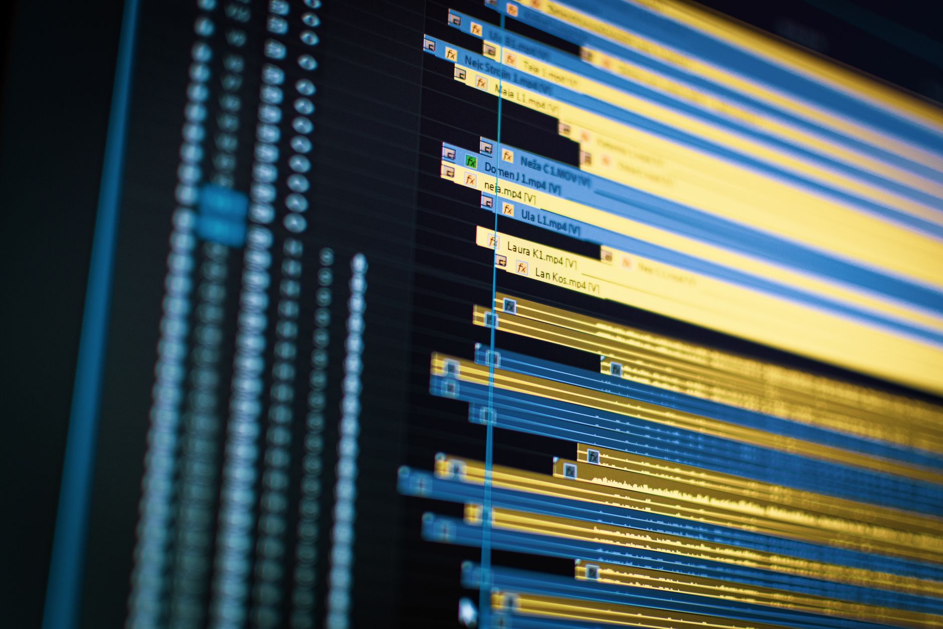 close-up of a laptop screen displaying a SaaS access permission dashboard with color-coded agent activity timelines and flagged anomalies