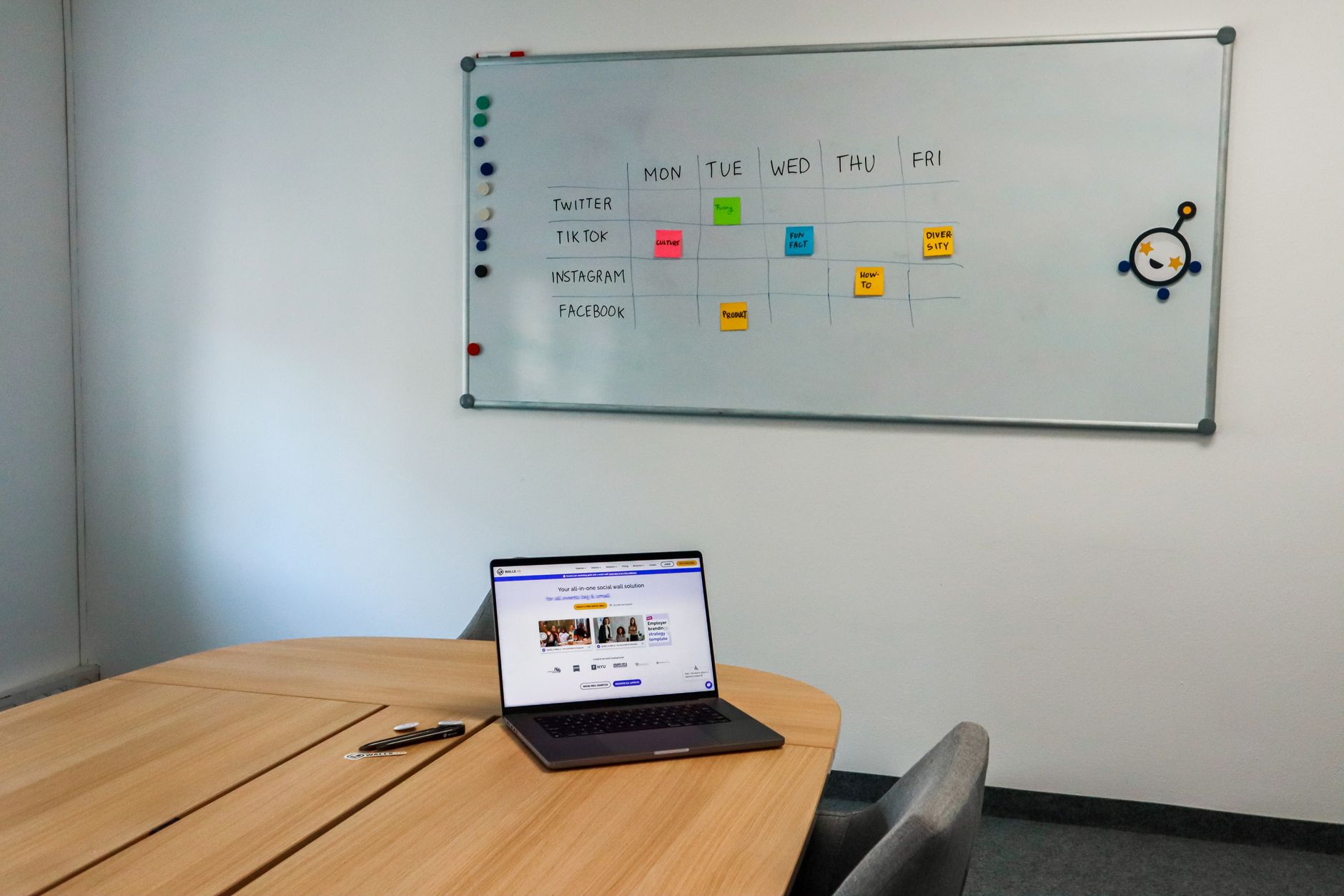 a sleek laptop screen displaying a multi-panel productivity dashboard with calendar, email, and a task management interface open simultaneously, on a clean wooden office desk